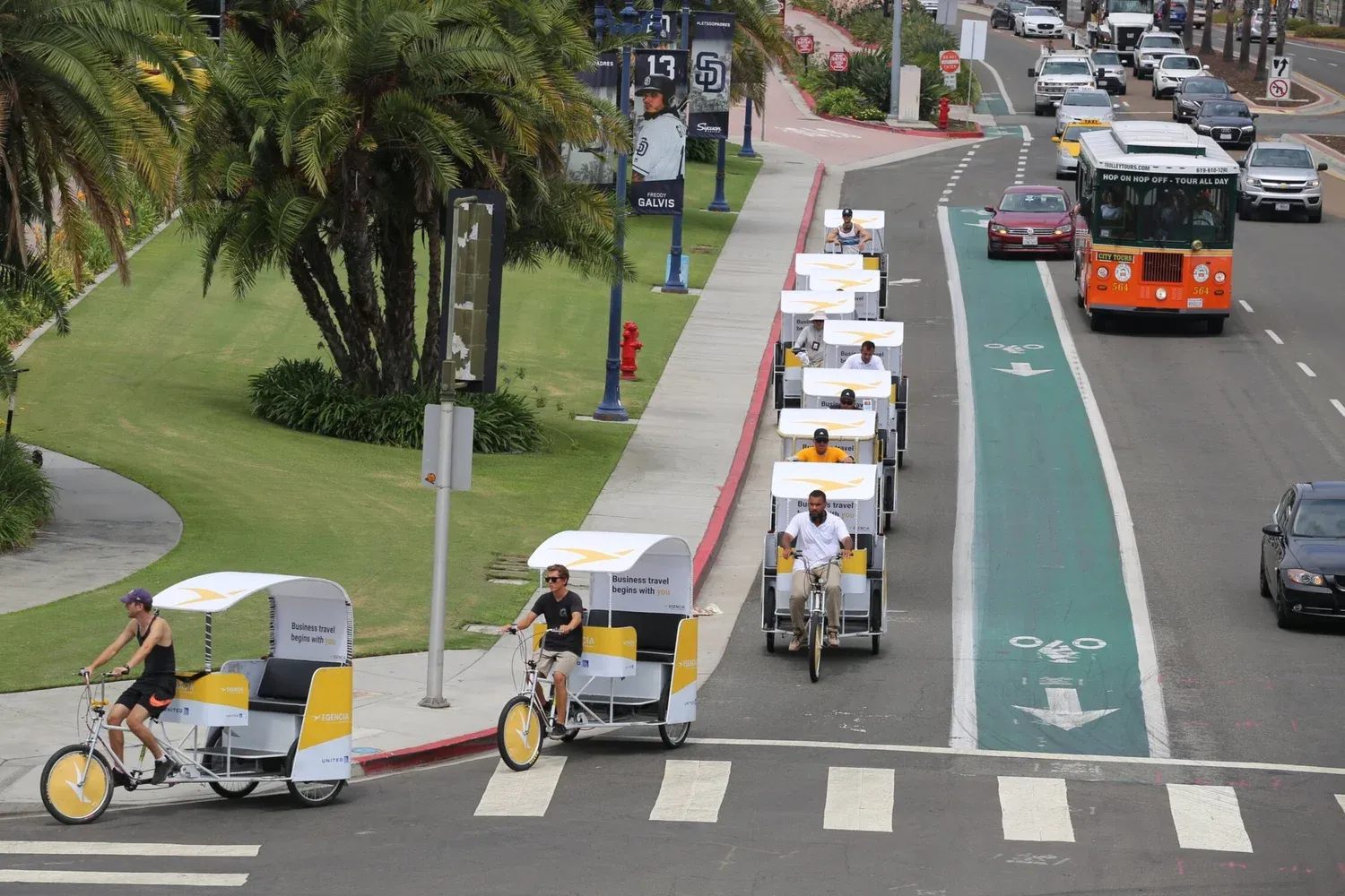 VIP Pedicab electric pedicab fleet lined up for a branded advertising parade in downtown San Diego
