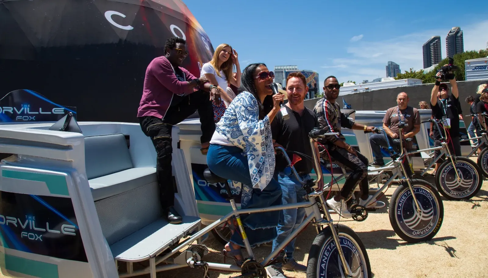 Guests riding in a branded VIP Pedicab during San Diego Comic-Con